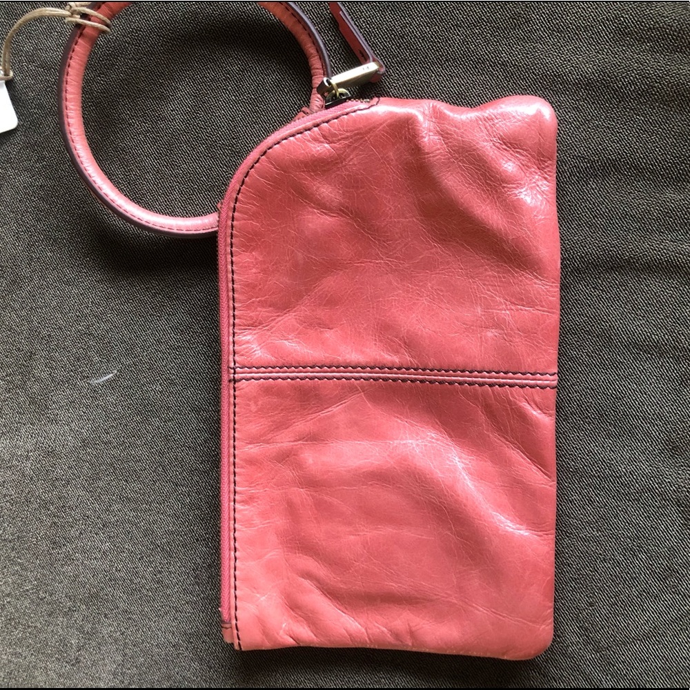 Pink leather clutch